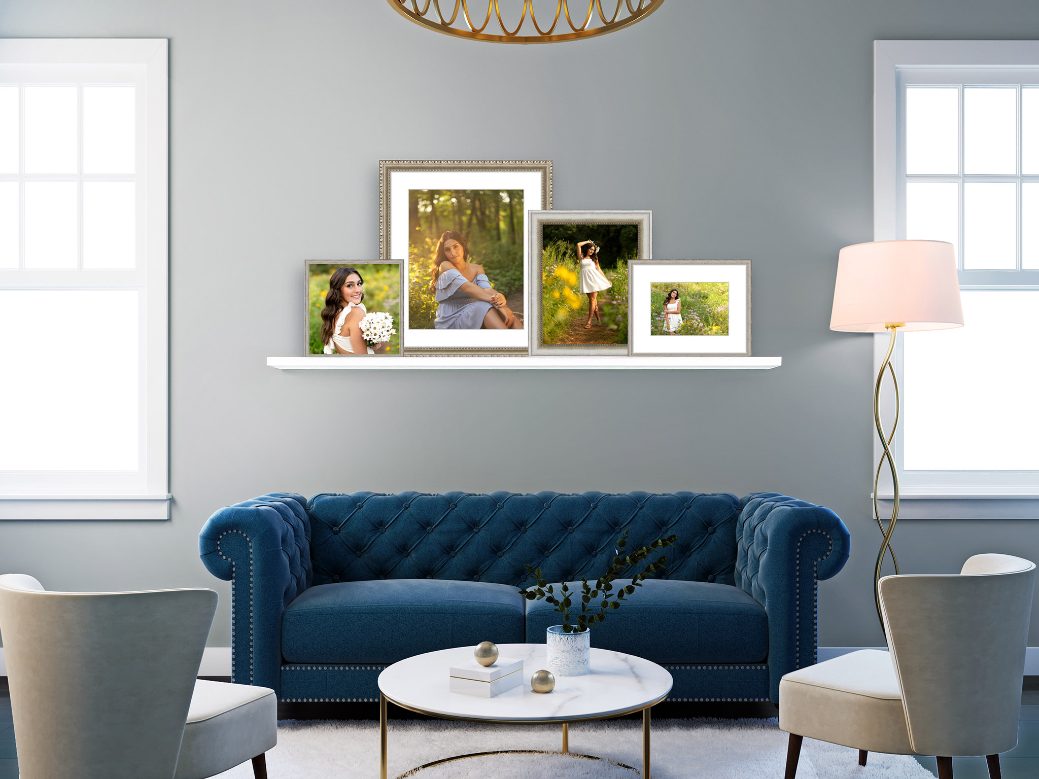 A modern living room with a blue tufted sofa, two chairs, a round table, a floor lamp, and framed family photos on a wall shelf—don’t forget backing up your photos to keep those cherished memories safe.